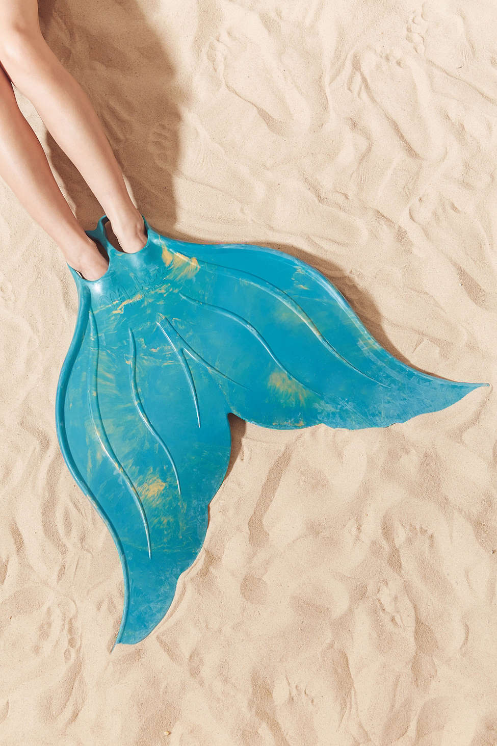 Mermaid tail | Any one of these finds from Urban Outfitters could make your next get summer together the party of the century.