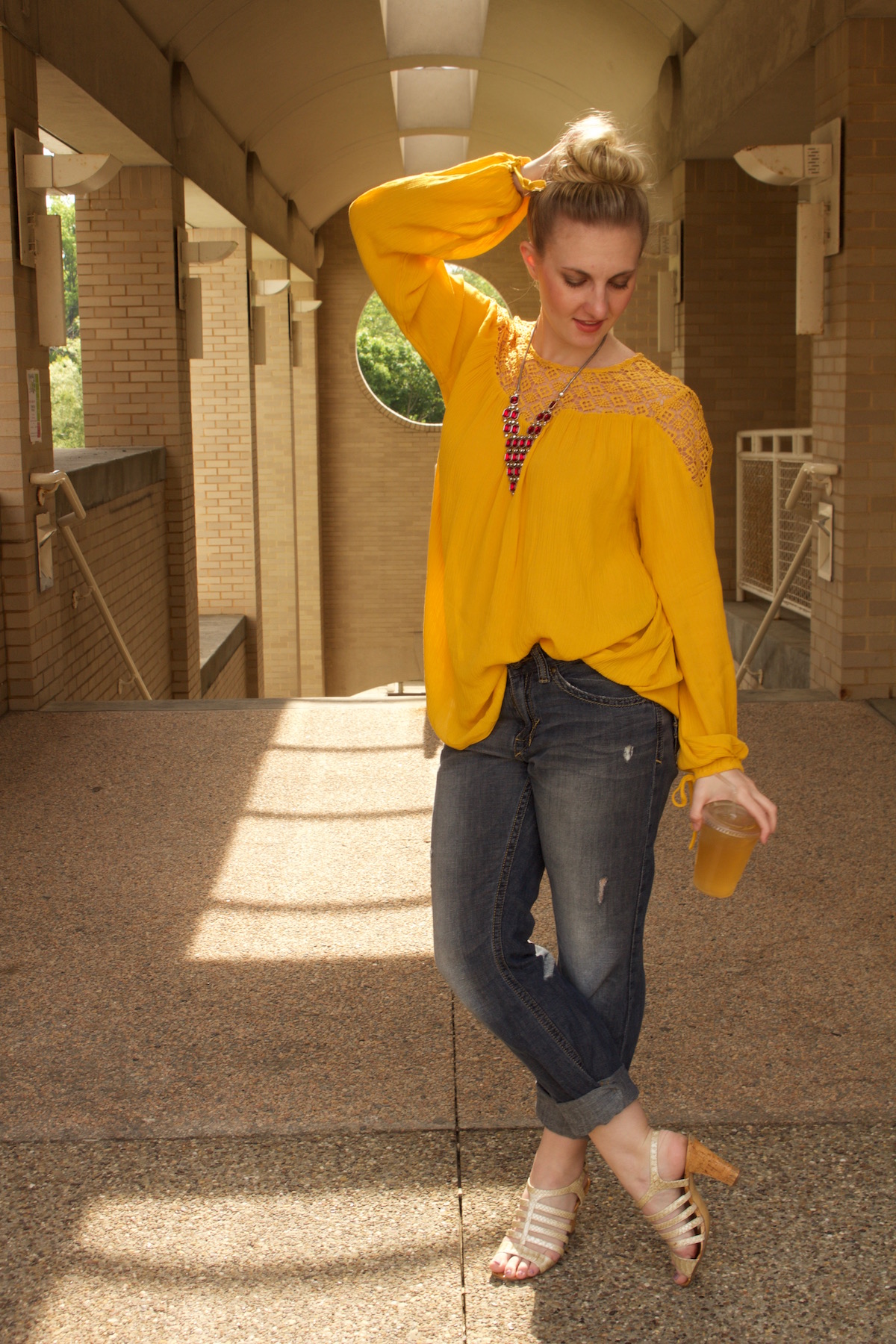 boy friend jeans, yellow crochet blouse, Passiana red pyramid necklace | styled by Allyn Lewis