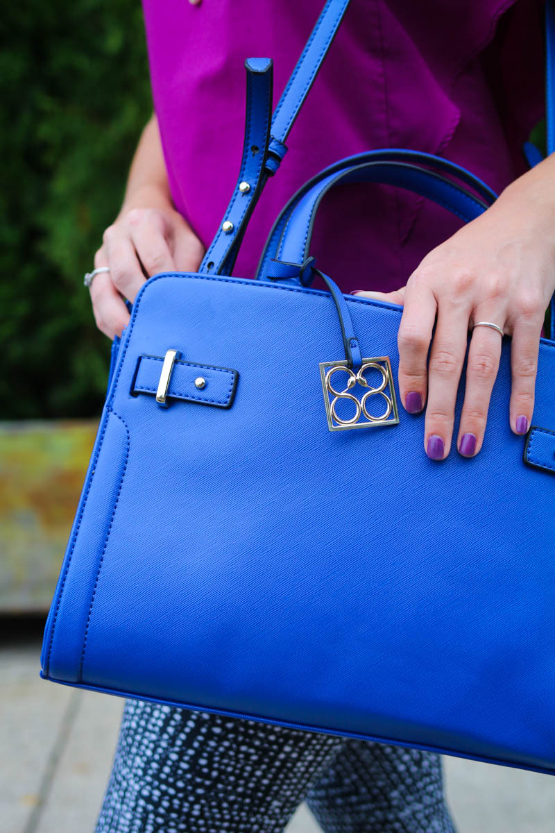 Fashion blogger Allyn Lewis wearing a satchel from 88 Handbags during New York Fashion Week. 