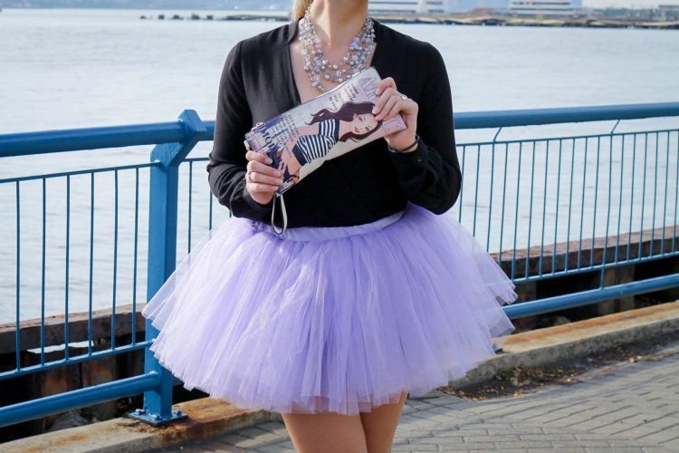 Allyn Lewis of The Gem in a tutu and long sleeve romper look at New York Fashion Week.