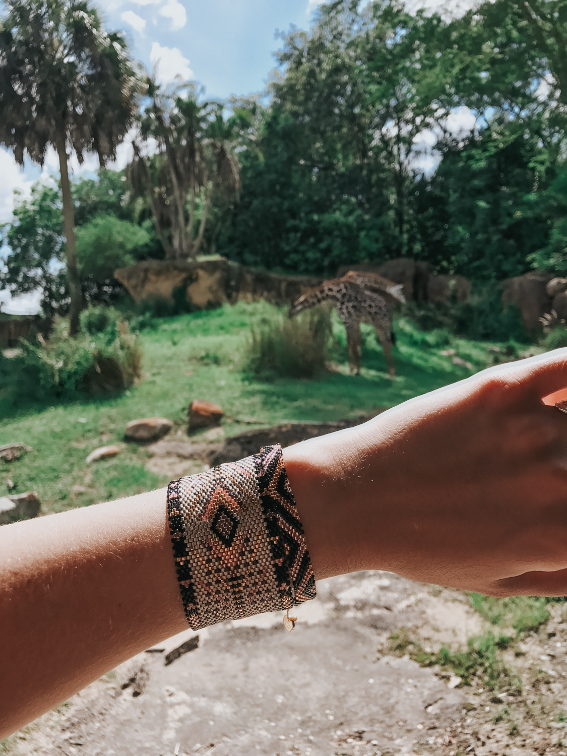Showing off my @kutulakiss bracelets during the Kilimanjaro Safari at Animal Kingdom 