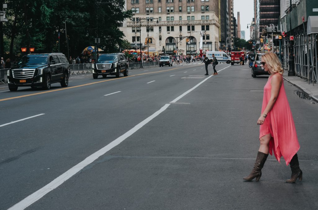 New York Fashion Week Look: Coral Maxi Dress and Knee High Boots - the perfect summer to fall transition look.