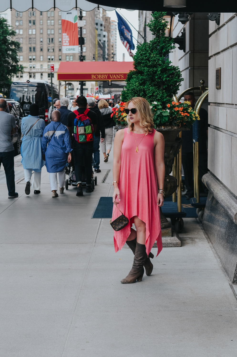 New York Fashion Week Look: Coral Maxi Dress and Distressed Boots - the perfect summer to fall transition look.