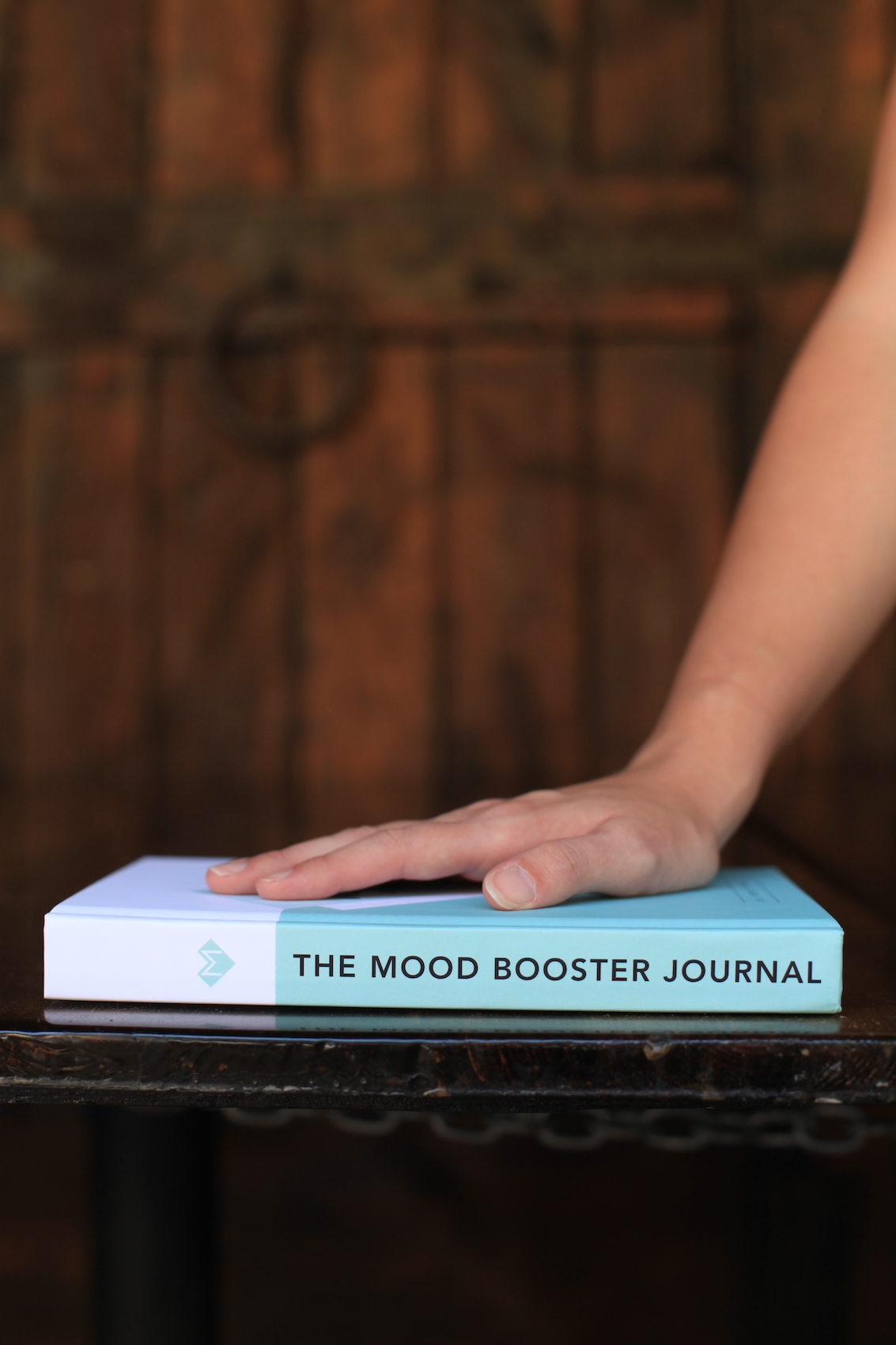 How writing in The Mood Booster Journal improves my mental health, gives me better control over my emotions, and helpes me cultivate more happiness. 