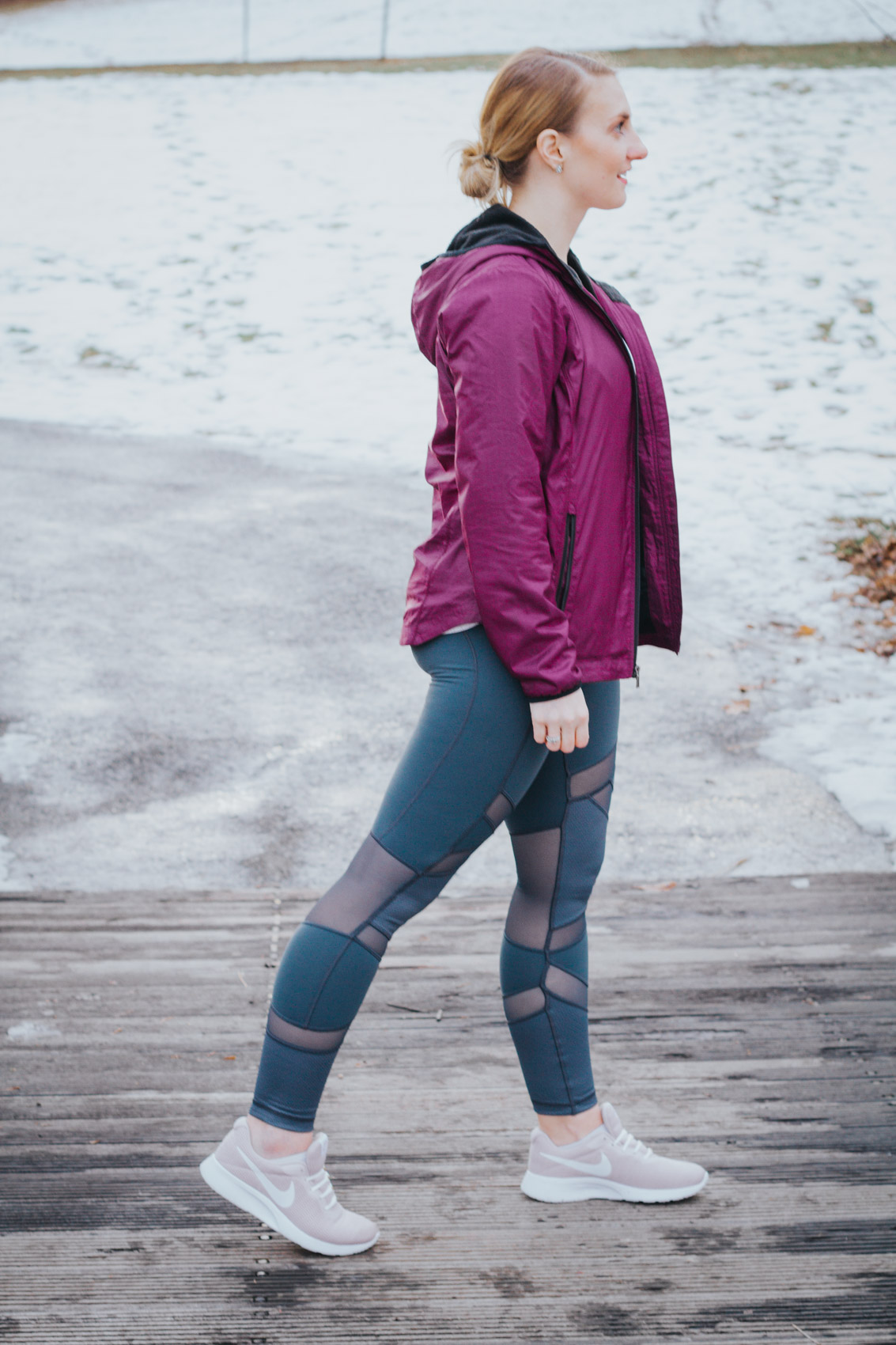 Lifestyle blogger, Allyn Lewis of The Gem, styles a winter workout look with a purple Columbia Sportswear jacket and CALIA by Carrie Underwood leggings.
