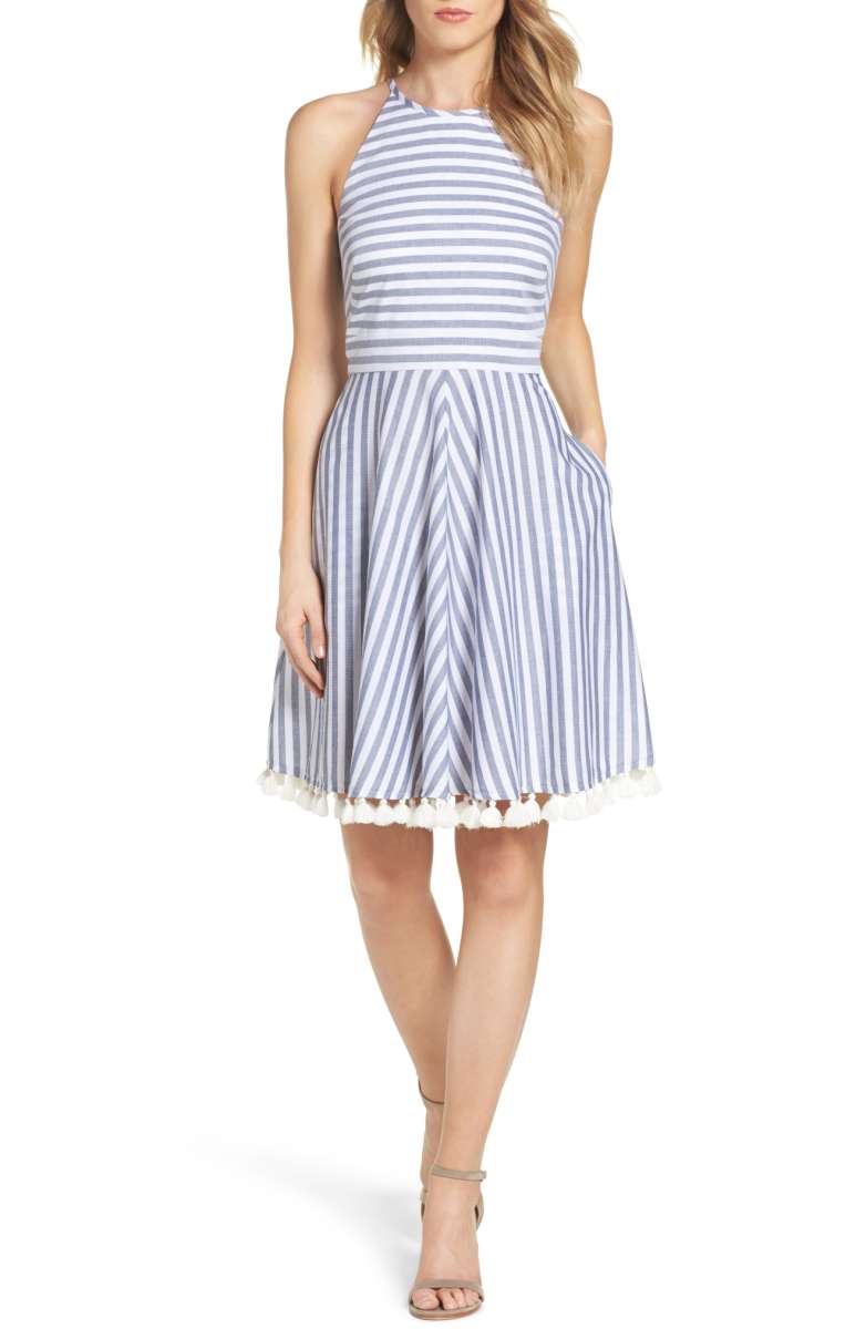 My eyes like the contrast of the stripes going in different directions on this blue summer dress and the swingy tassels on the bottom are so cute! 