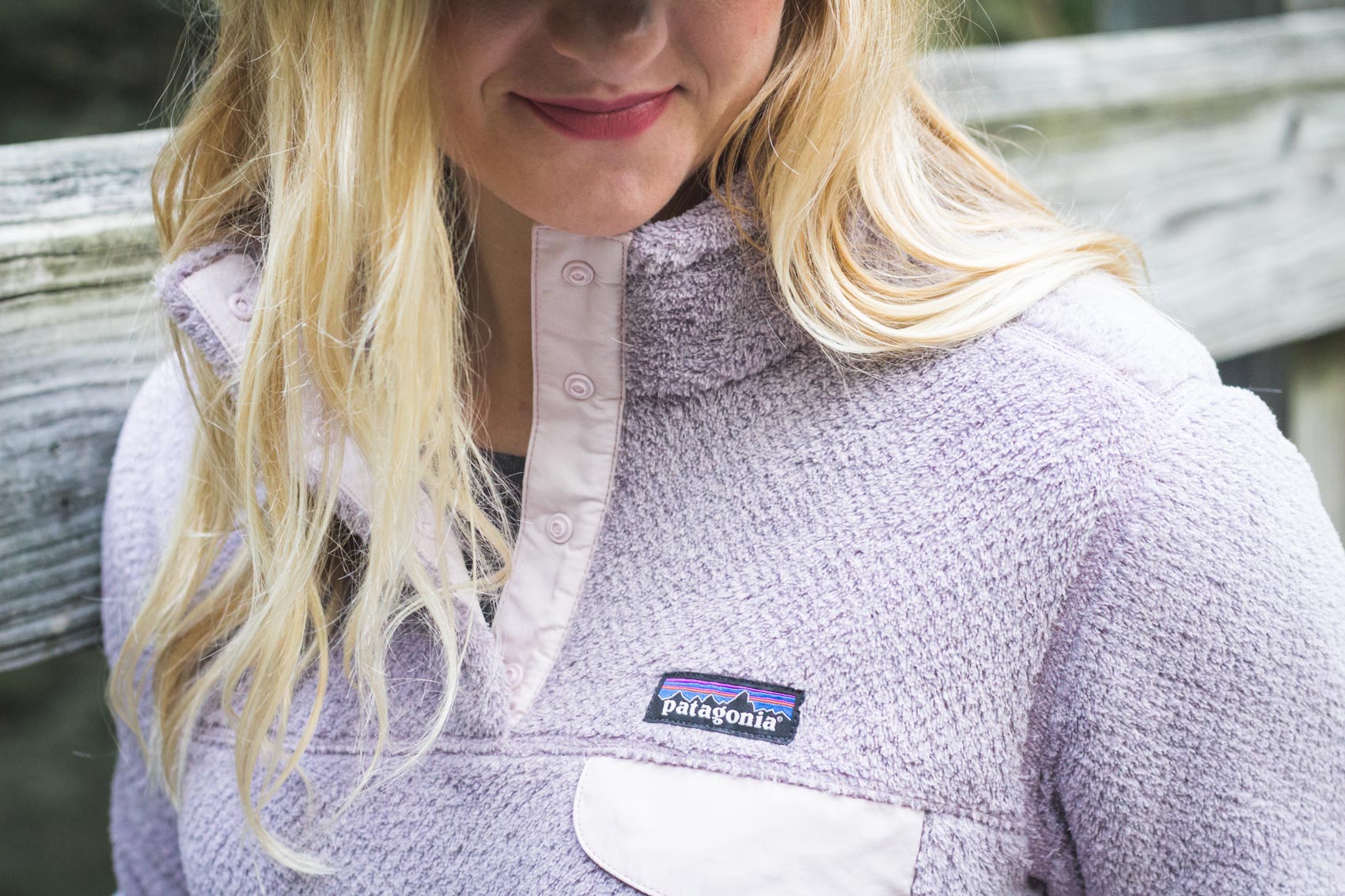 Allyn Lewis from The Gem wearing a purple Patagonia pullover for fall. 