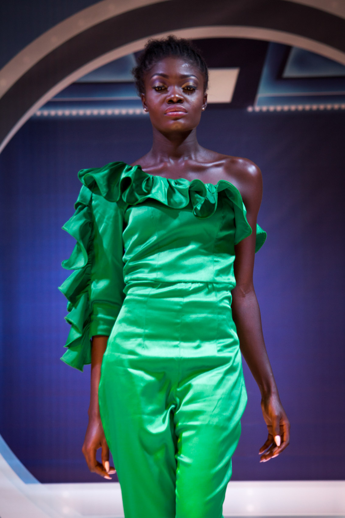 Emerald green jumpsuit on the runway at Accra Fashion Week