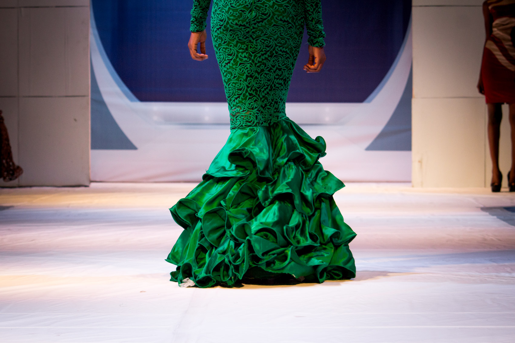 Emerald green gown on the runway at Accra Fashion Week