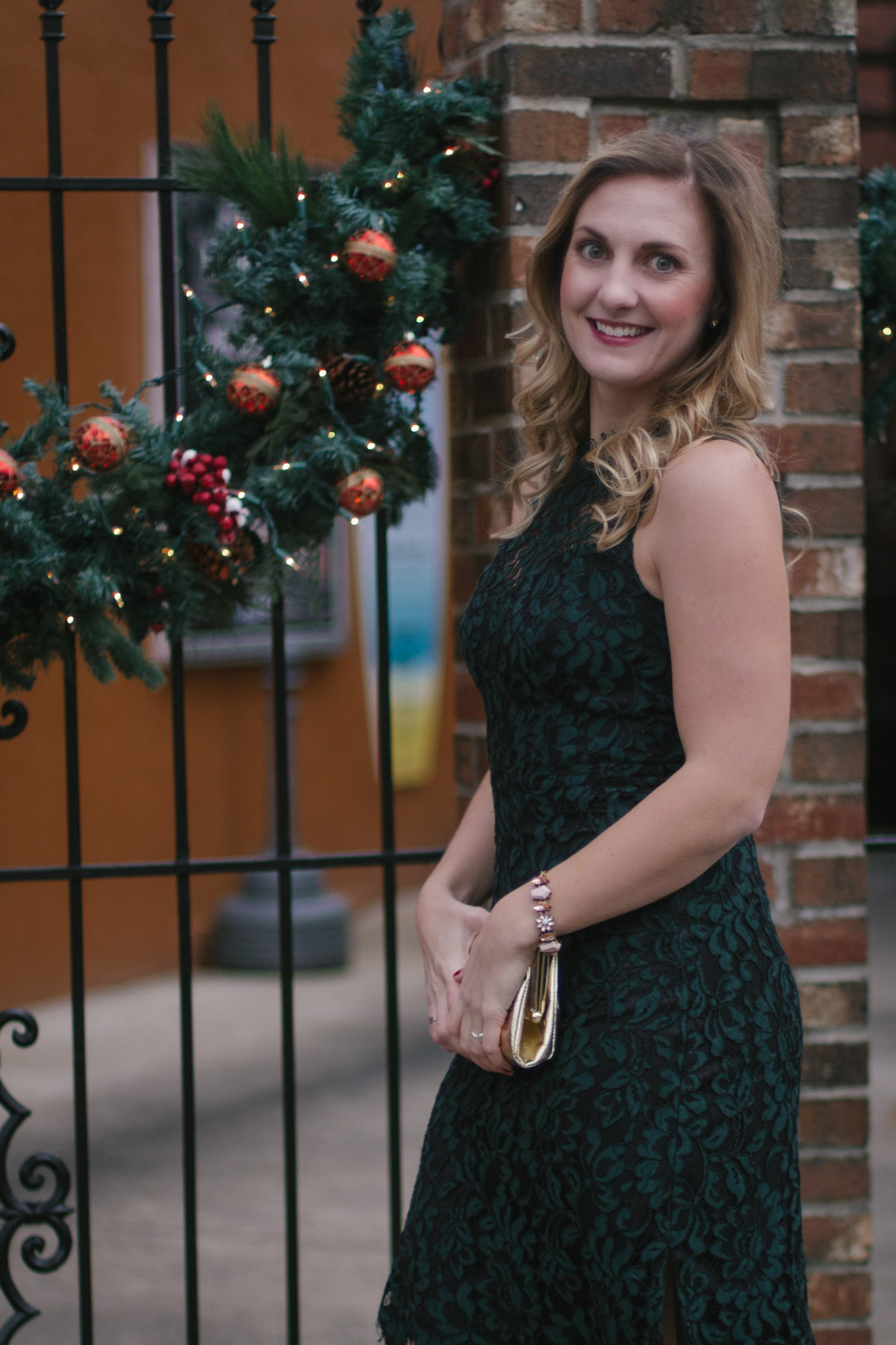 From casual in plaid to festive in a little red dress, these holiday outfits are timeless and perfect to wear to all of those upcoming parties. Allyn Lewis styles a faux fur coat, nude heels, and a green lace Eliza J dress. 