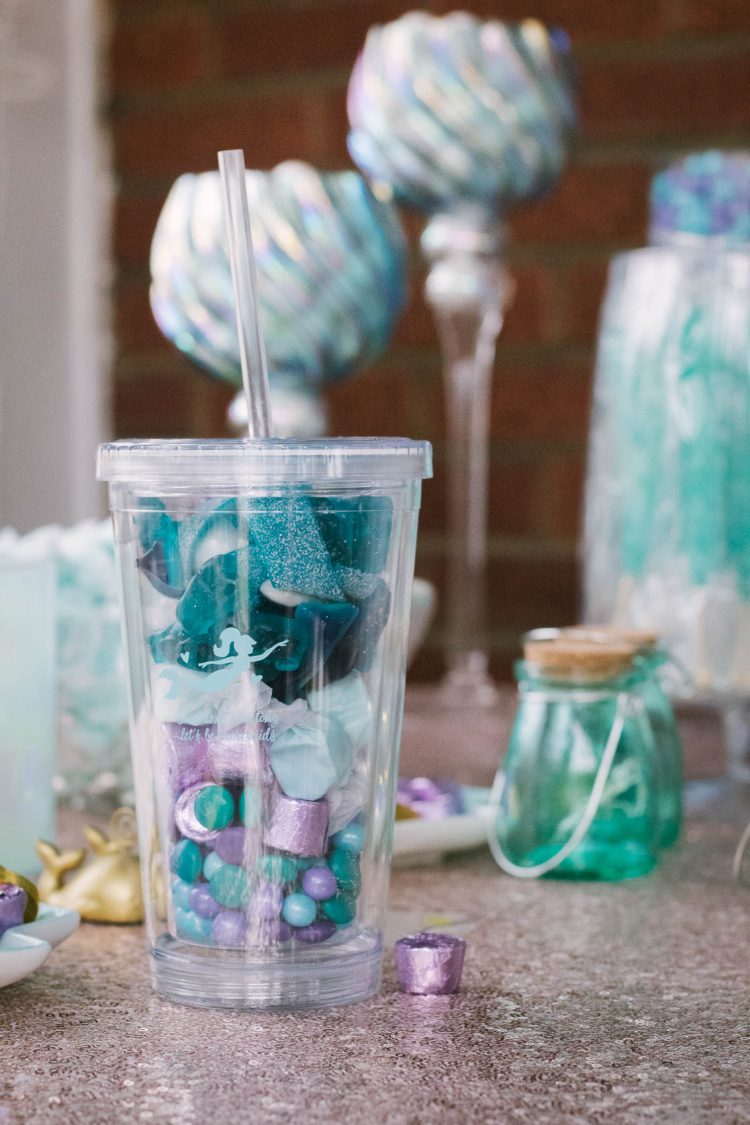 This tumbler from Kate Aspen acts as a practical and cute baby shower favor