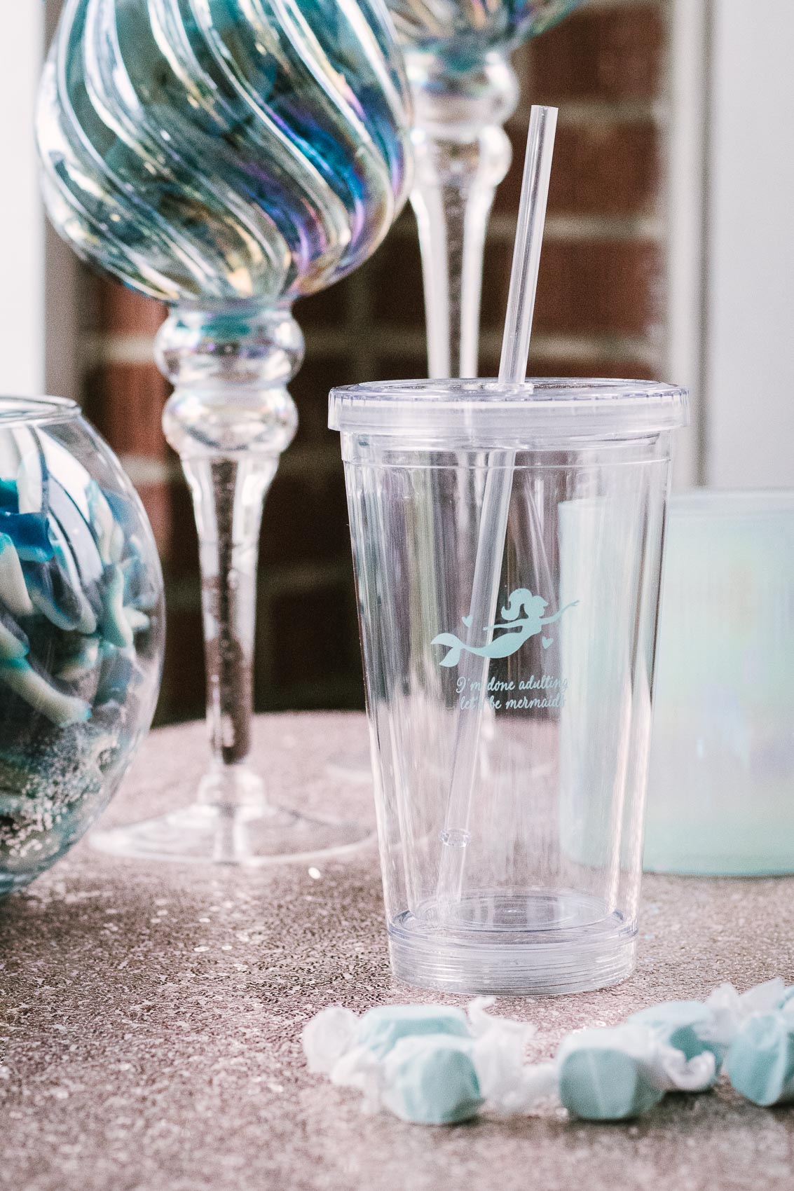 This tumbler from Kate Aspen acts as a practical and cute baby shower favor