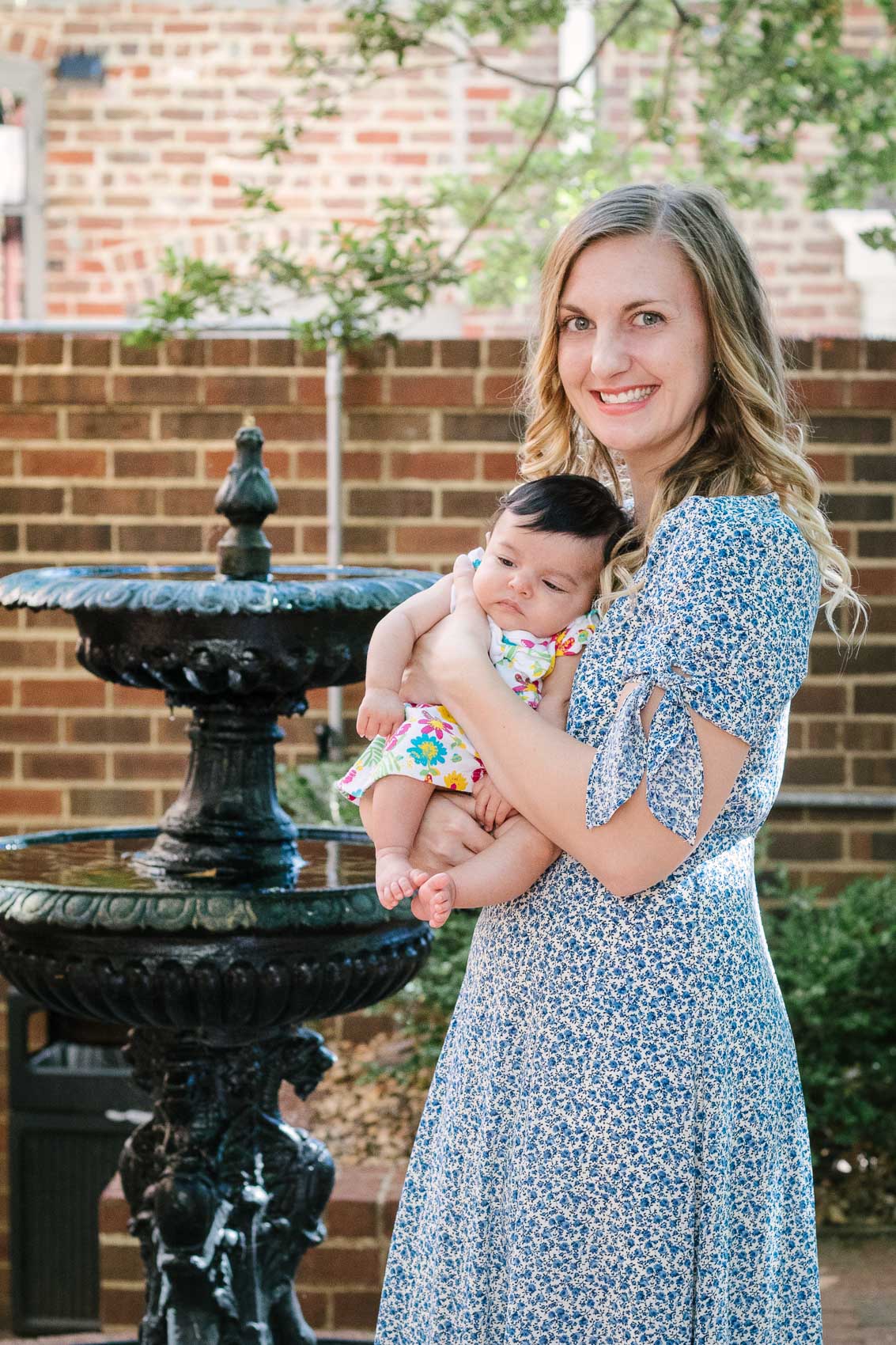 Fashion blogger Allyn Lewis styles the Gal Meets Gal Aurora blue floral maxi dress for a casual Summer outfit on a road trip to Linden Row Inn - A historic boutique hotel in Richmond, Virginia 