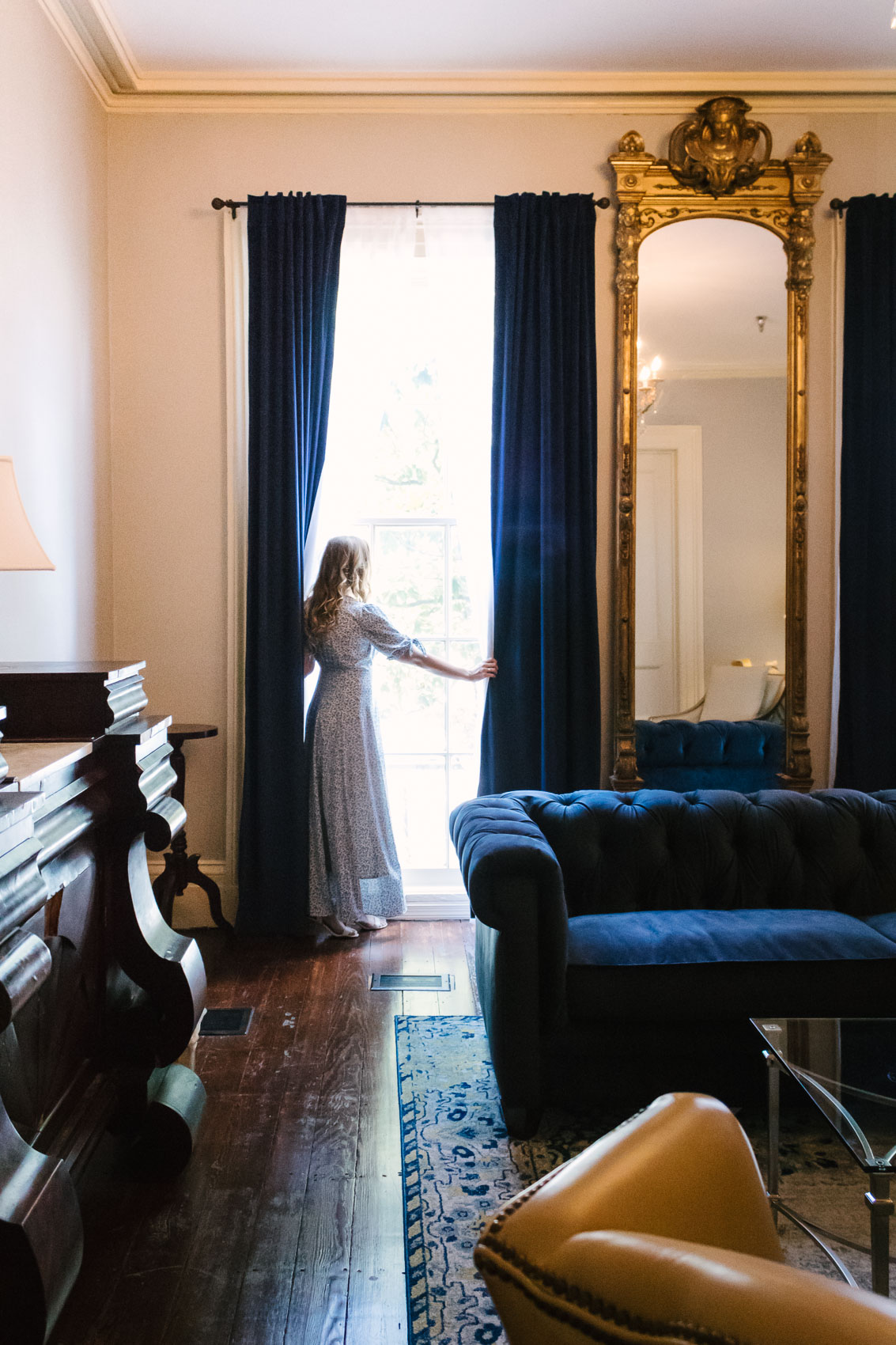 Fashion blogger Allyn Lewis styles the Gal Meets Gal Aurora blue floral maxi dress for a casual Summer outfit on a road trip to Linden Row Inn - A historic boutique hotel in Richmond, Virginia 