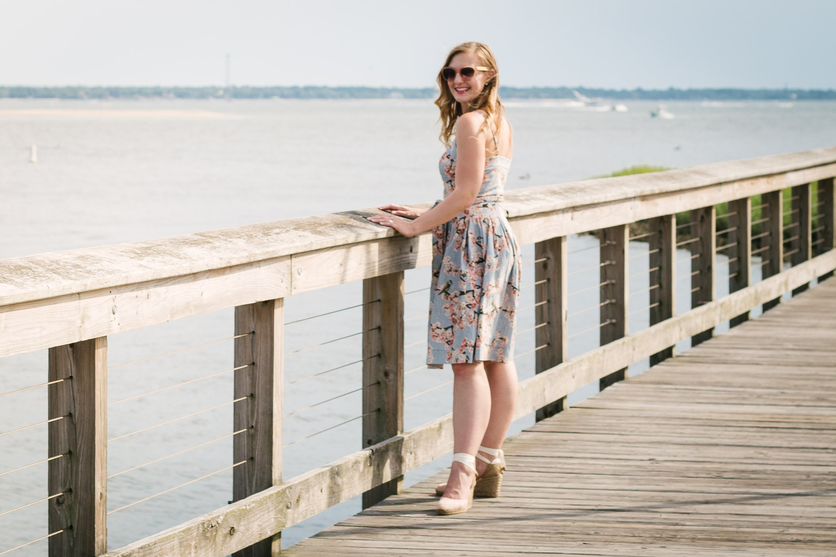 Things to Do in Mount Pleasant, SC: Dolphin Spotting at Shem Creek Park | Wearing the Gal Meets Glam Collection cherry blossom print Daphne dress with pink wedge espadrilles 