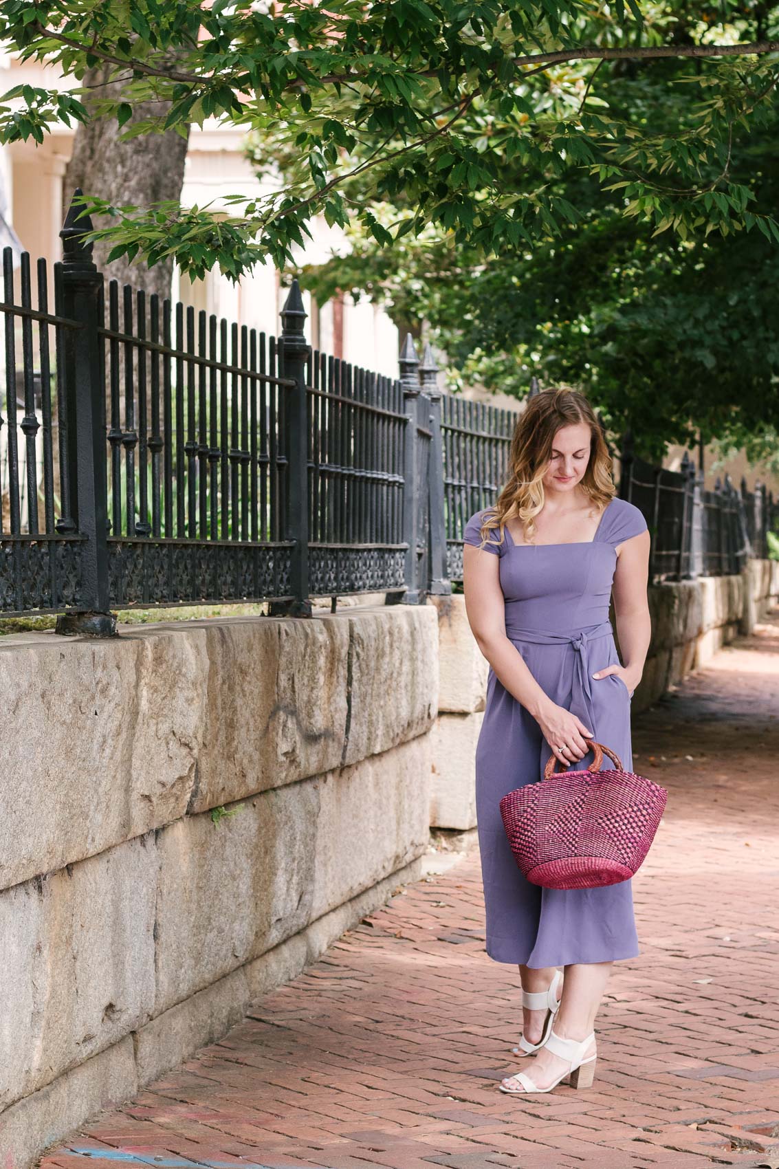 Fashion blogger Allyn Lewis styles the Gal Meets Gal Veronica purple crepe jumpsuit for a casual Summer outfit on a road trip to Linden Row Inn - A historic boutique hotel in Richmond, Virginia