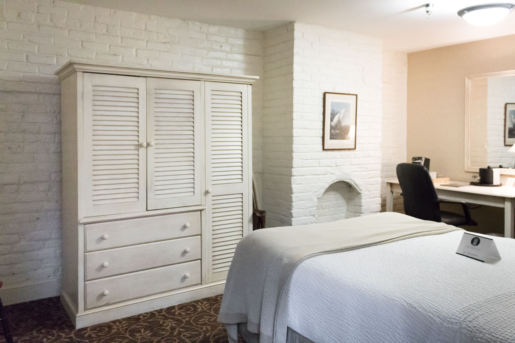 1800's carriage houses turned into pastel themed guest rooms at Linden Row Inn - a historic hotel in Richmond, Virginia