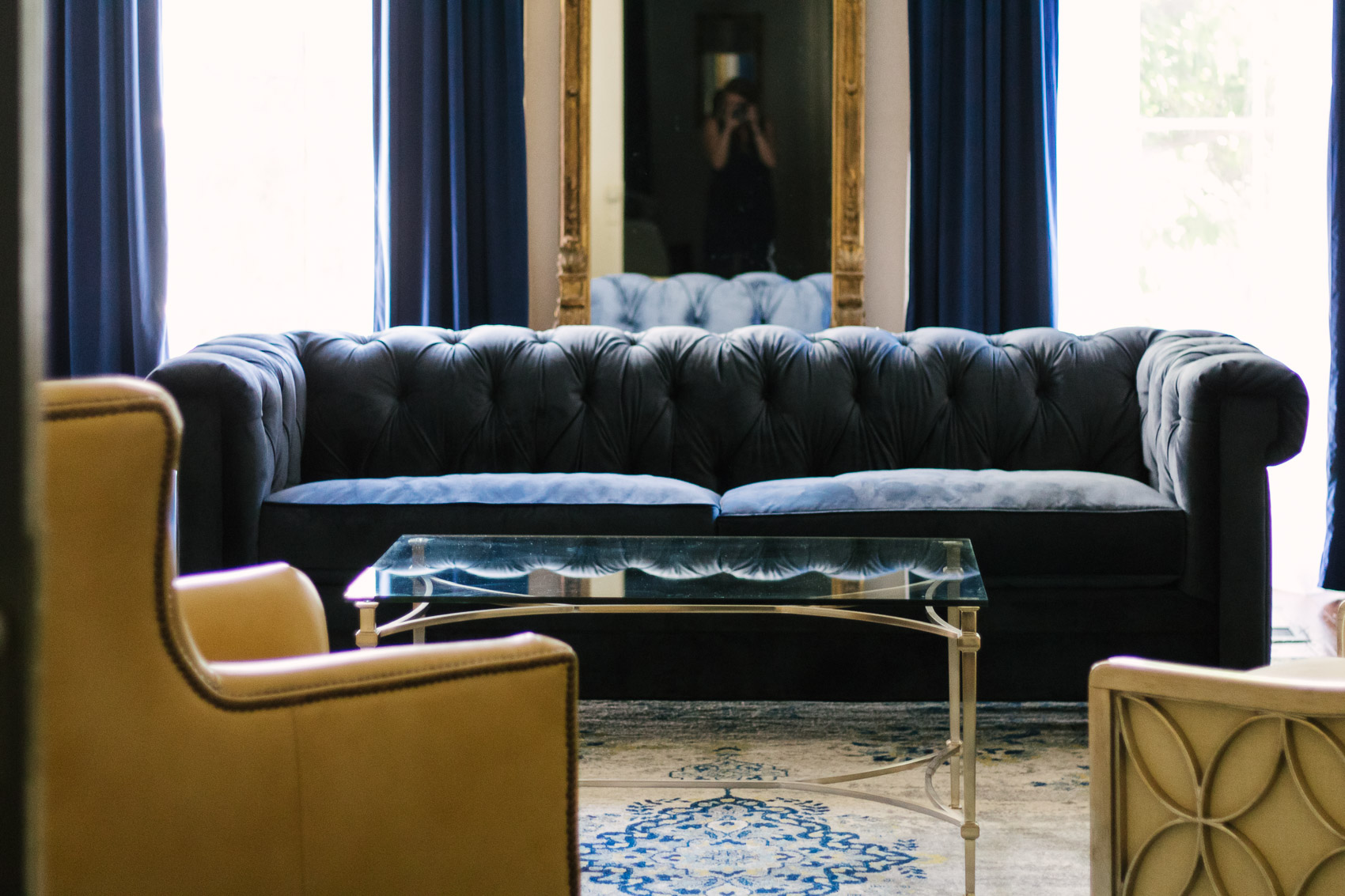 The most beautiful blue velvet couch at Linden Row Inn - a historic boutique hotel in Richmond, Virginia