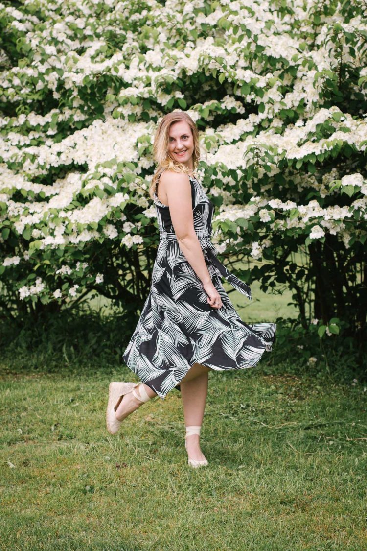 Allyn Lewis of The Gem shares a casual summer outfit in a classy black and white palm print dress.