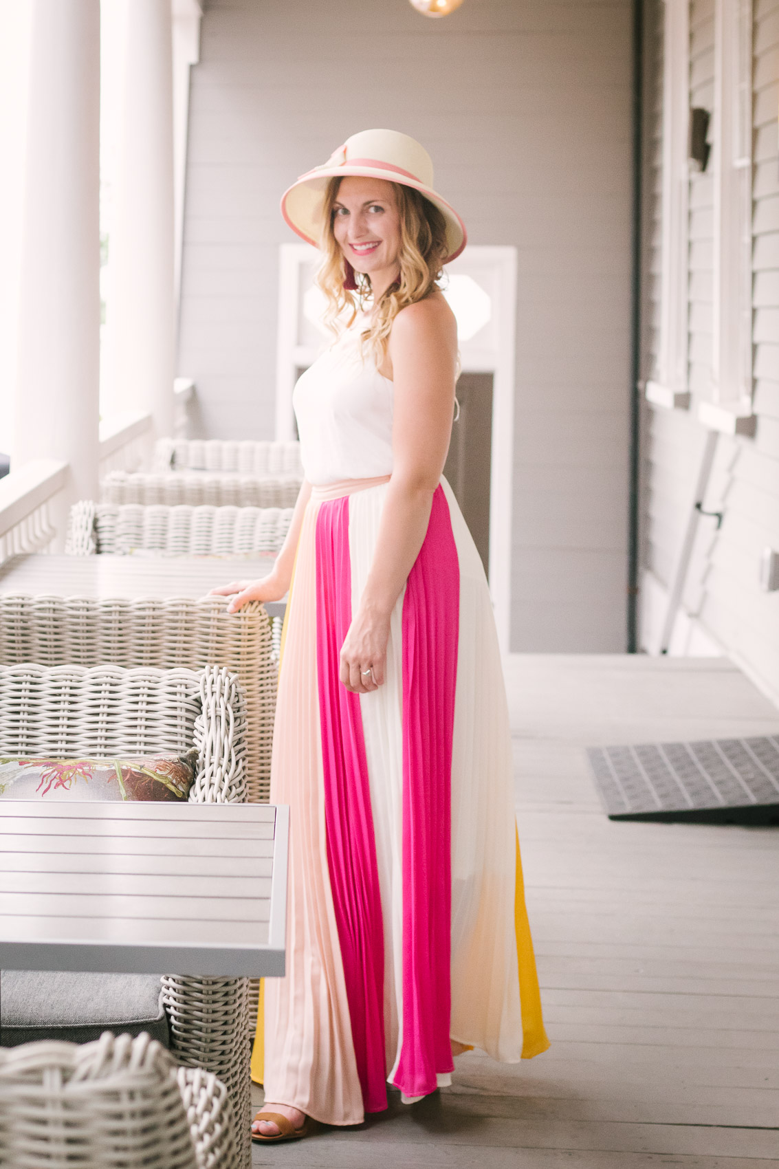 Fashion blogger Allyn Lewis styles a color blocked pleated maxi skirt for a day exploring Charleston, SC. | How to style a pleated maxi skirt | summer outfit inspiration