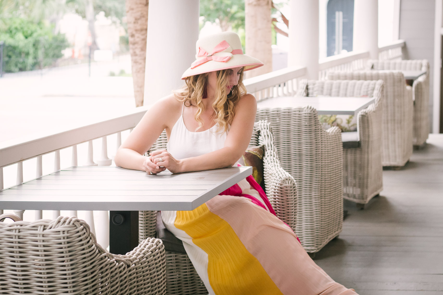 Fashion blogger Allyn Lewis styles a color blocked pleated maxi skirt for a day exploring Charleston, SC. | How to style a pleated maxi skirt | summer outfit inspiration