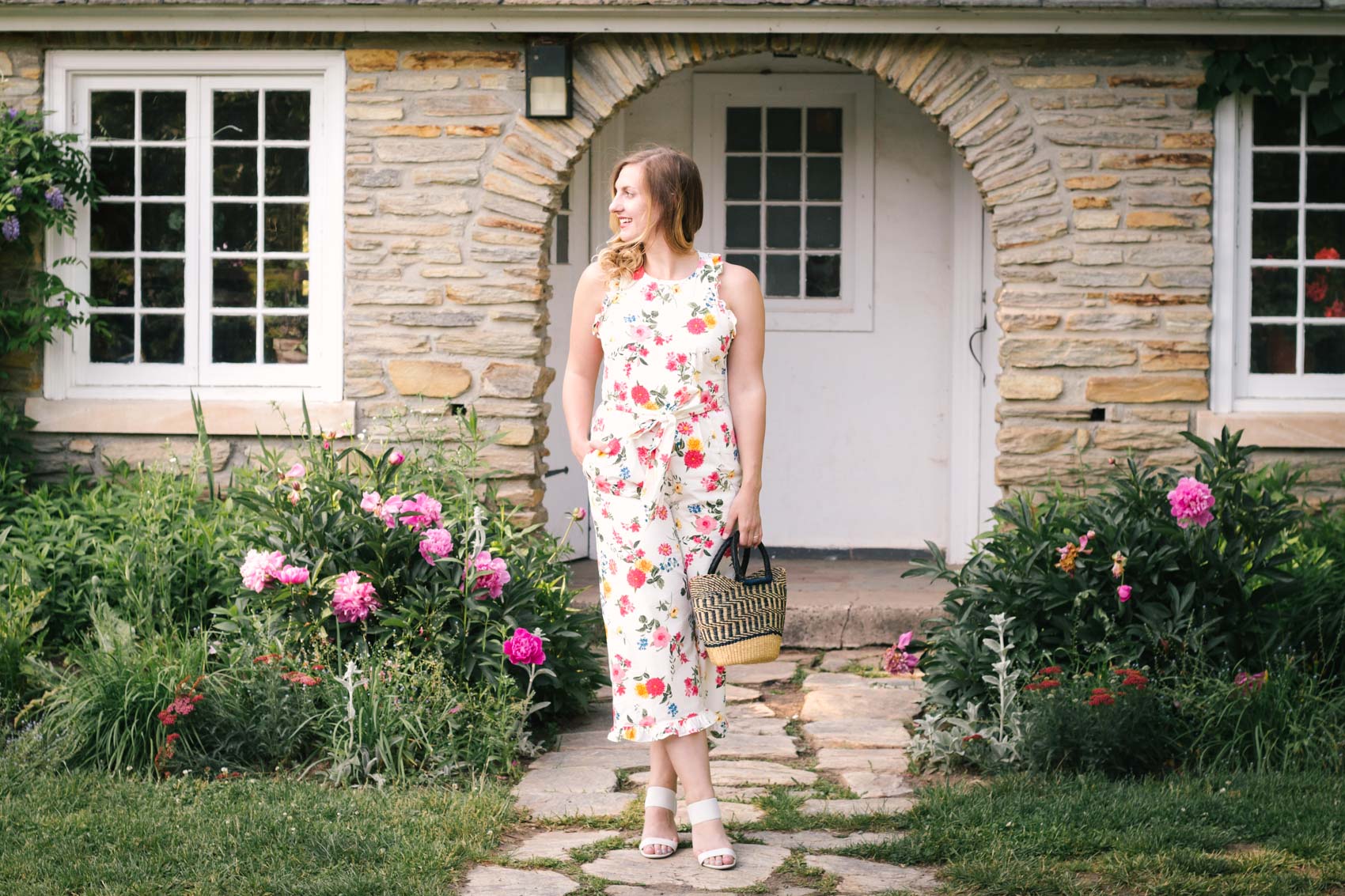 Allyn Lewis styles the Gal Meets Glam floral Beverly jumpsuit for summer