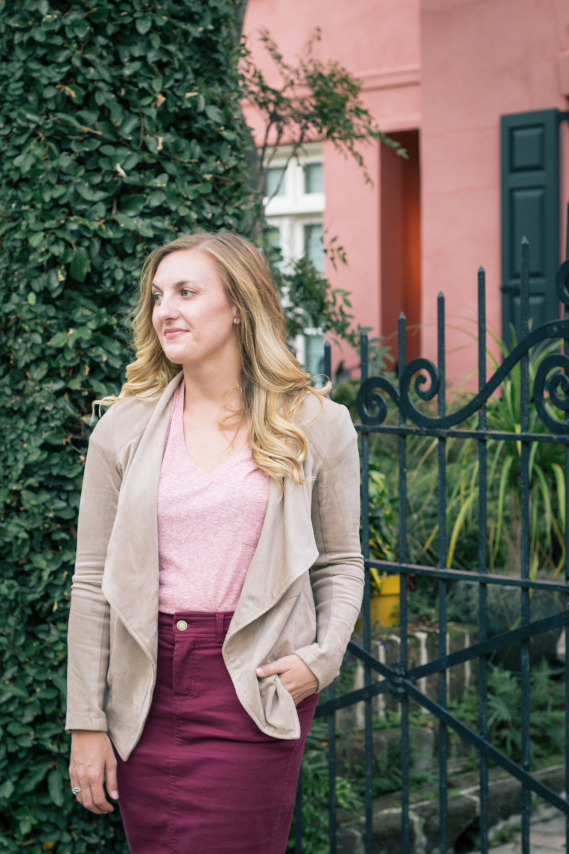 Allyn Lewis of The Gem styles a casual fall outfit with a burgundy pencil skirt and faux suede drape jacket in Charleston, SC.