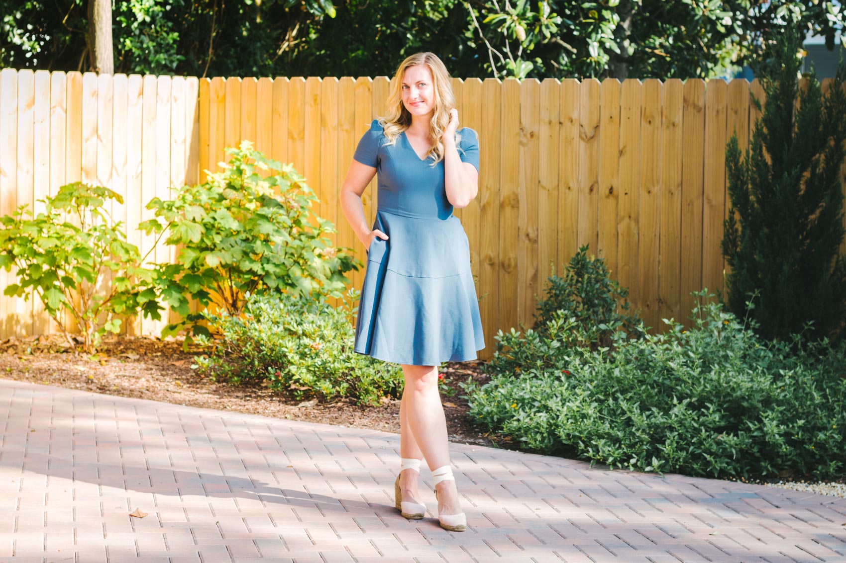 Allyn Lewis styles a Gal Meets Glam Collection fit and flare dress with pockets that is so versatile it can be worn in any season and to every occasion - workdays, weekends, and even weddings. Paired here with Castaner espadrilles at The Jarvis at 220 in New Bern, NC.