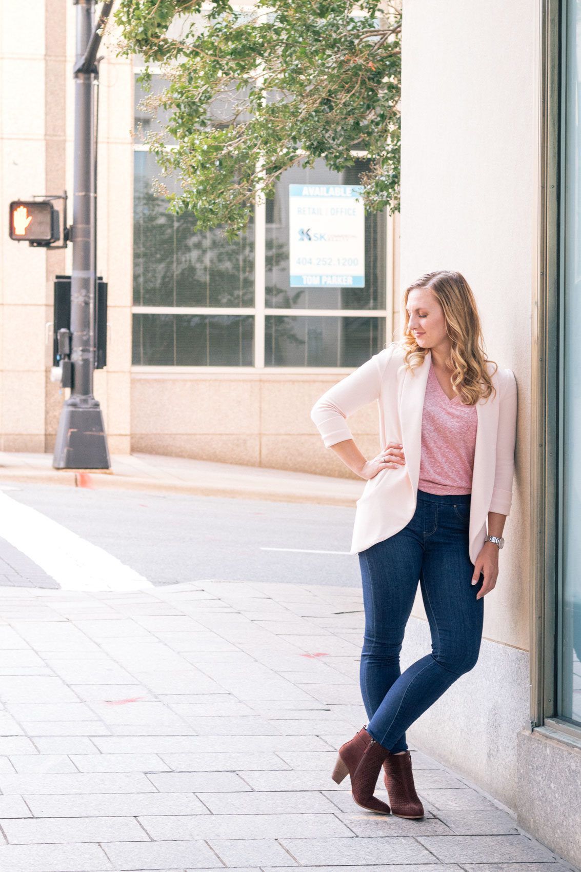 Pair a pink blazer over a simple t-shirt for an easy, classy outfit