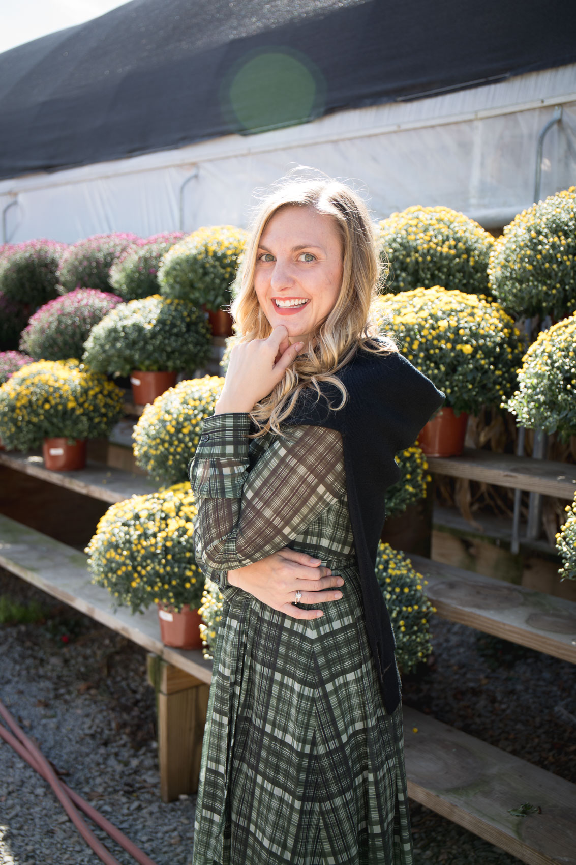 Apple picking in a plaid Gal Meets Glam Dress