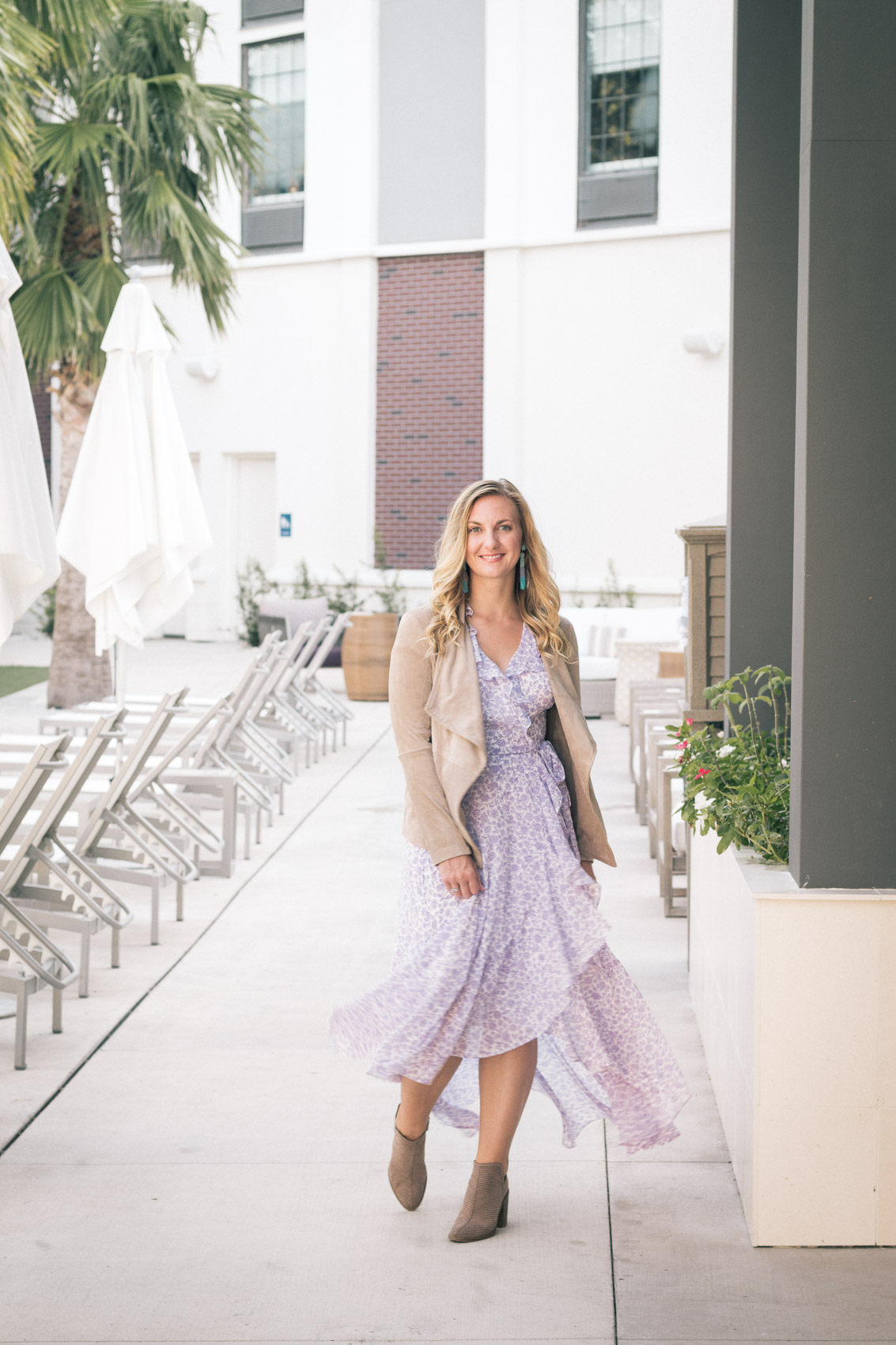 Outfit ideas for cold spring days - layer a jacket over a flowy dress and add ankle booties!
