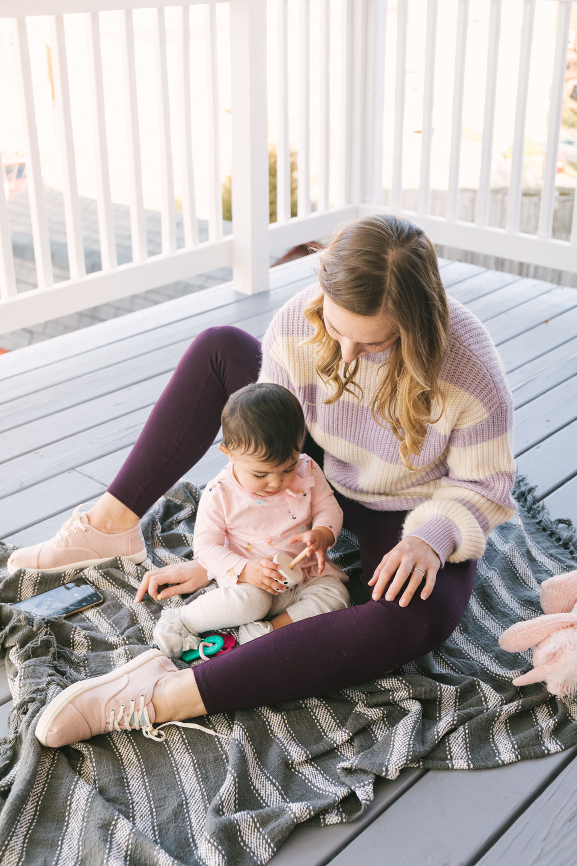 purple and white striped blossom sleeve sweater styled in a casual spring outfit (click for similar styles!)