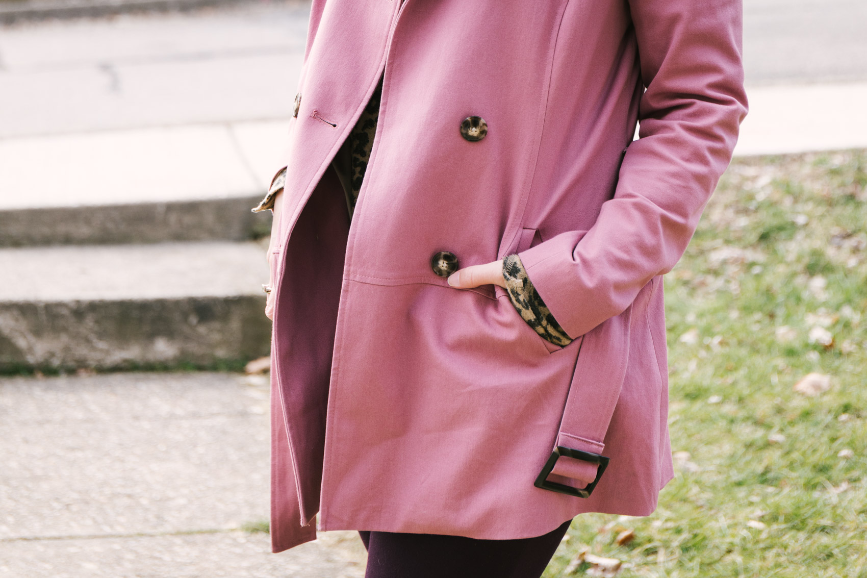 Inspiration and images for styling a women's pink trench coat outfit on chillier days. This dusty pink short trench coat is perfect for spring!