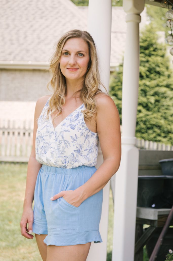 casual simple comfy outfit for summer with high waisted shorts and a tie front top