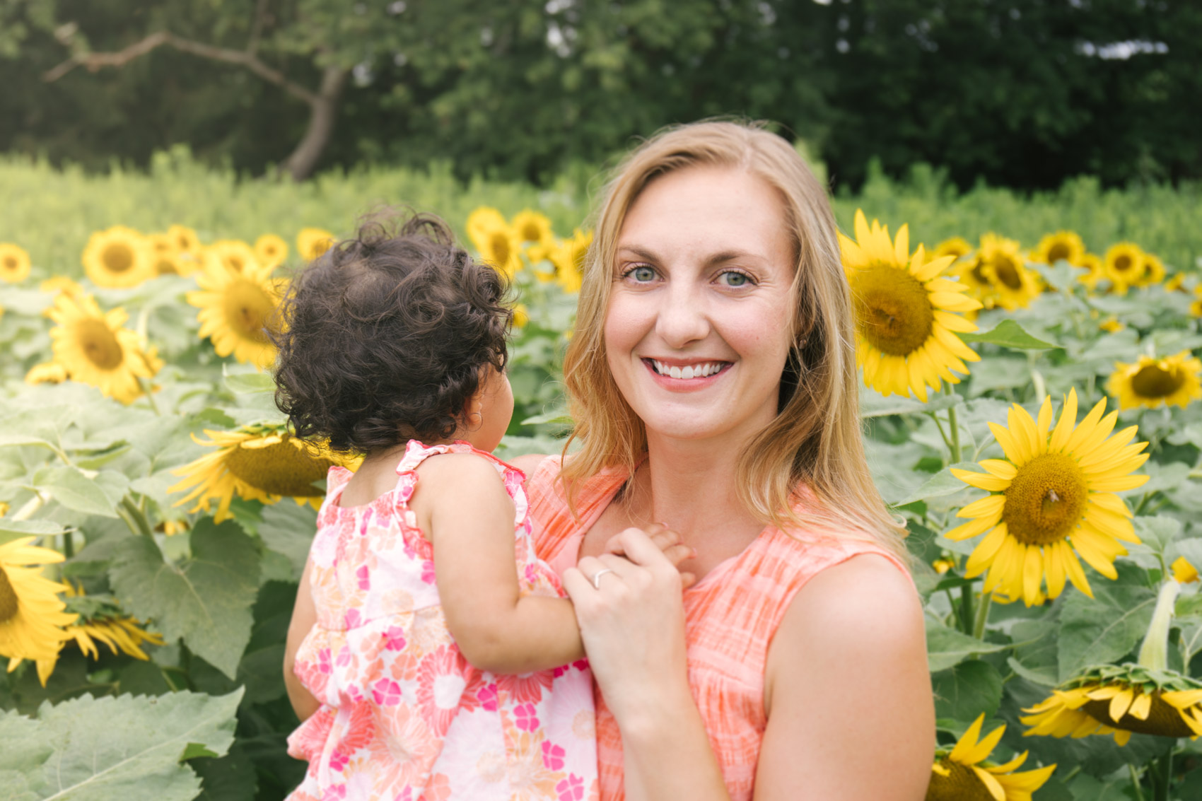 sunflower field photoshoot family outfit ideas | what to wear for sunflower field photos | coral maxi dress sunflower field casual outfit