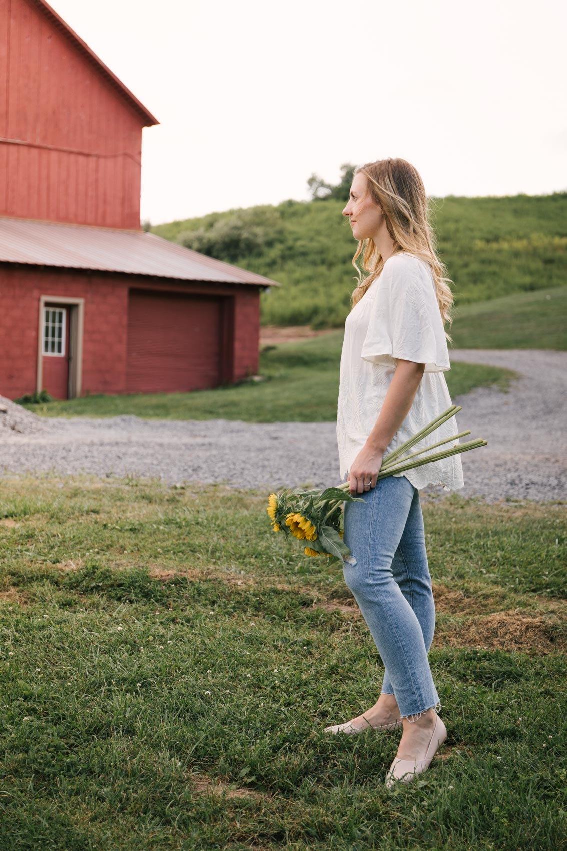 This Madewell Perfect Vintage jean outfit is ideal for embracing summer to fall style 2020 featuring a flowy white top and simple blush flats styled by Allyn Lewis at Red Barn Inn. #falloutfits #denimstyle #denimoutfit