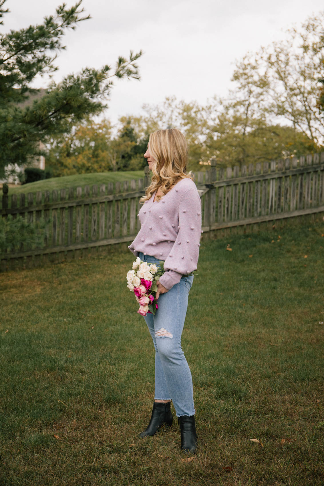 Madewell perfect vintage jeans styled with a purple bobble sweater and black booties for a fall or winter outfit 