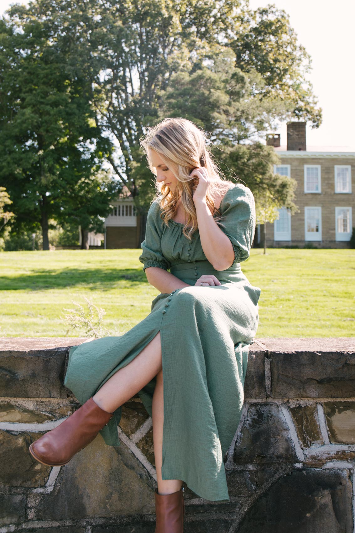 Allyn Lewis offers puff sleeve dress outfit inspiration in the Gal Meets Glam Joanna dress styled with ankle booties. 