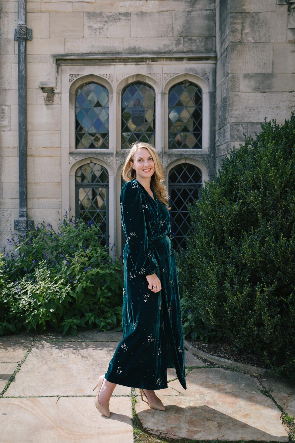 Allyn Lewis styles a glamorous velvet dress wrap dress for holiday outfit inspiration #winterfashion #fashionphotography #winteroutift 