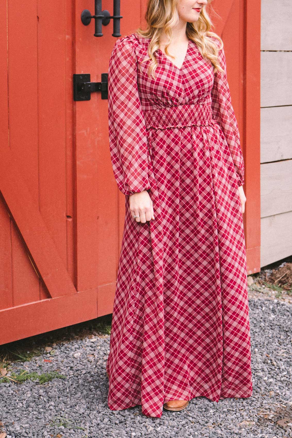 Christmas outfit inspiration featuring a red plaid long sleeve maxi dress with tartan print. 