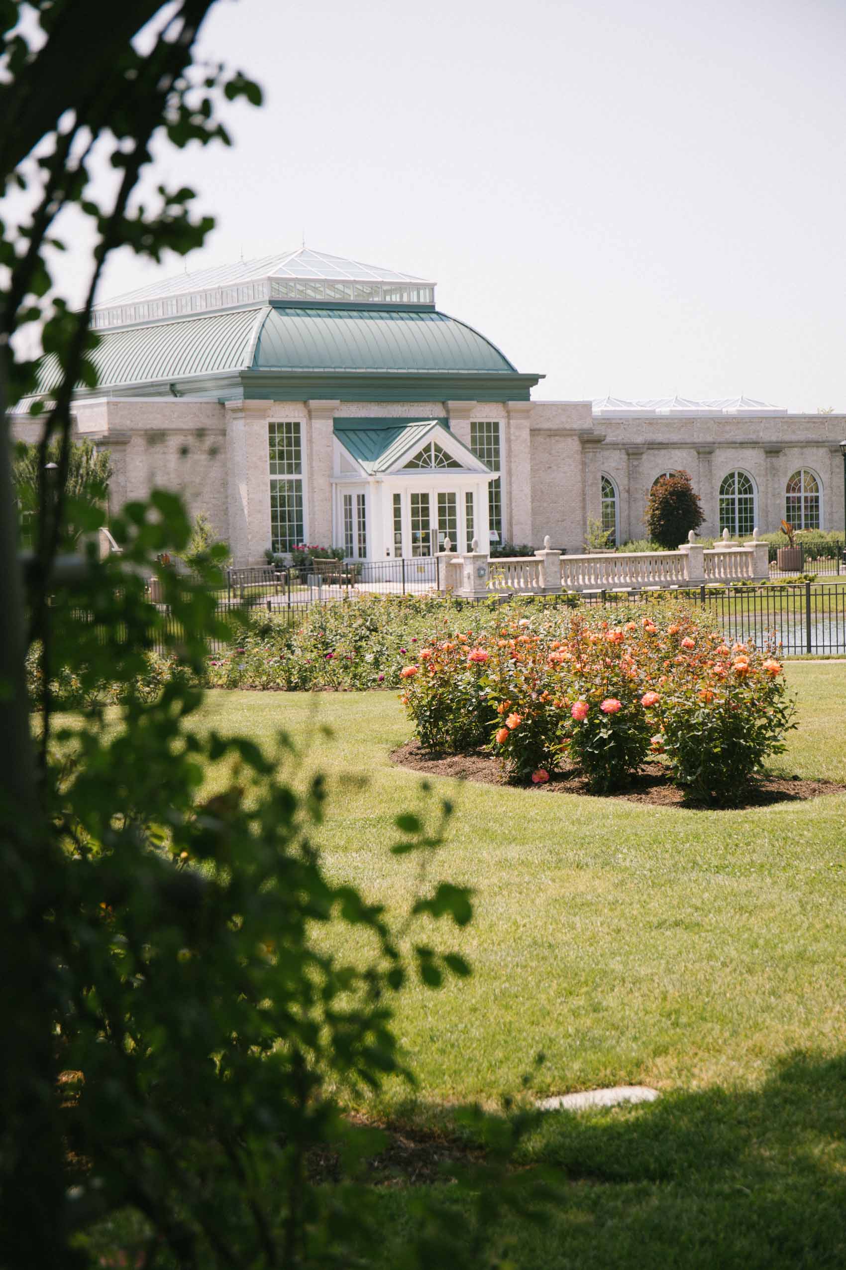 Gorgeous building surrounded by flowers at the Hershey Gardens in Pennsylvania. 