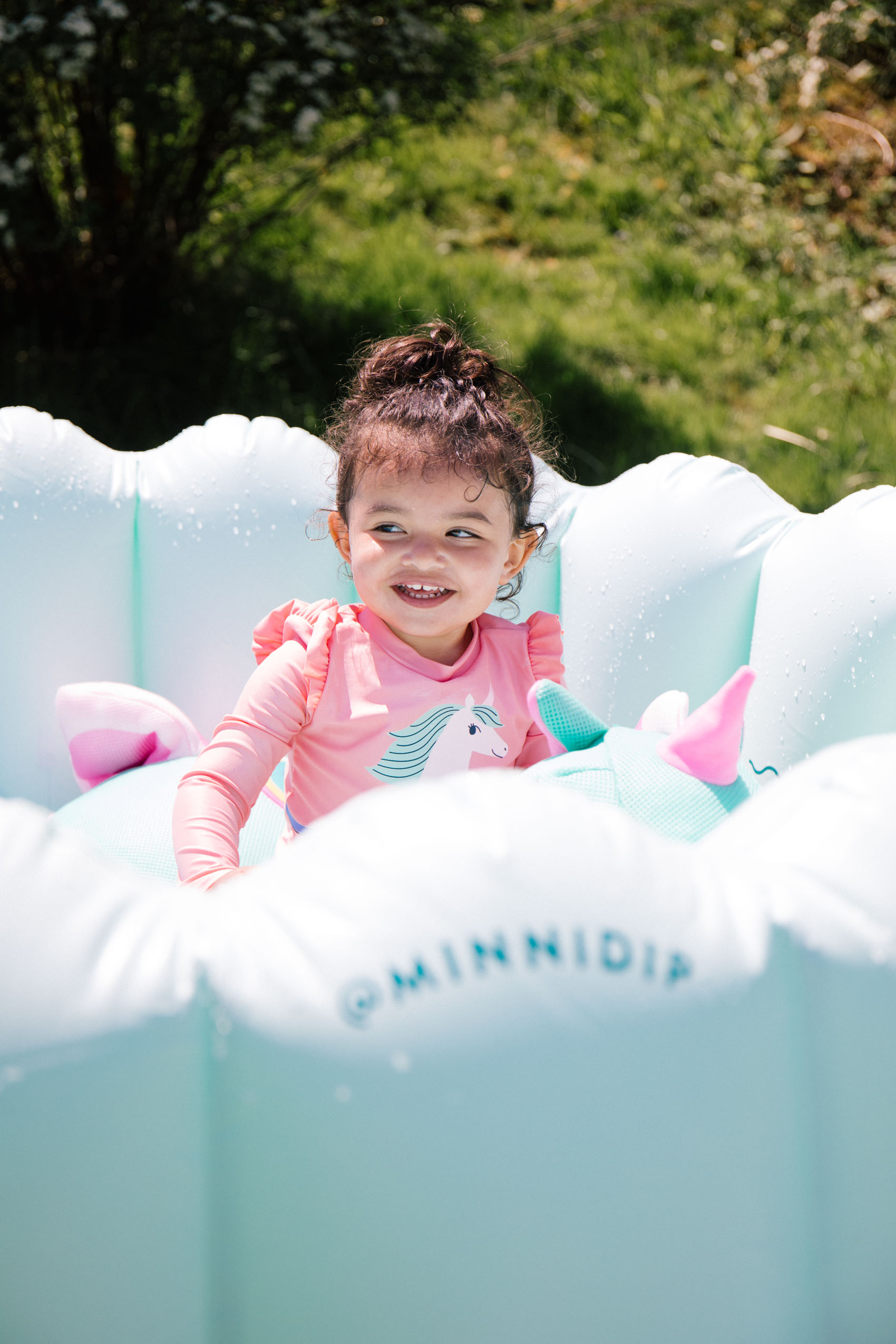 toddler in Minnidip kiddie pool