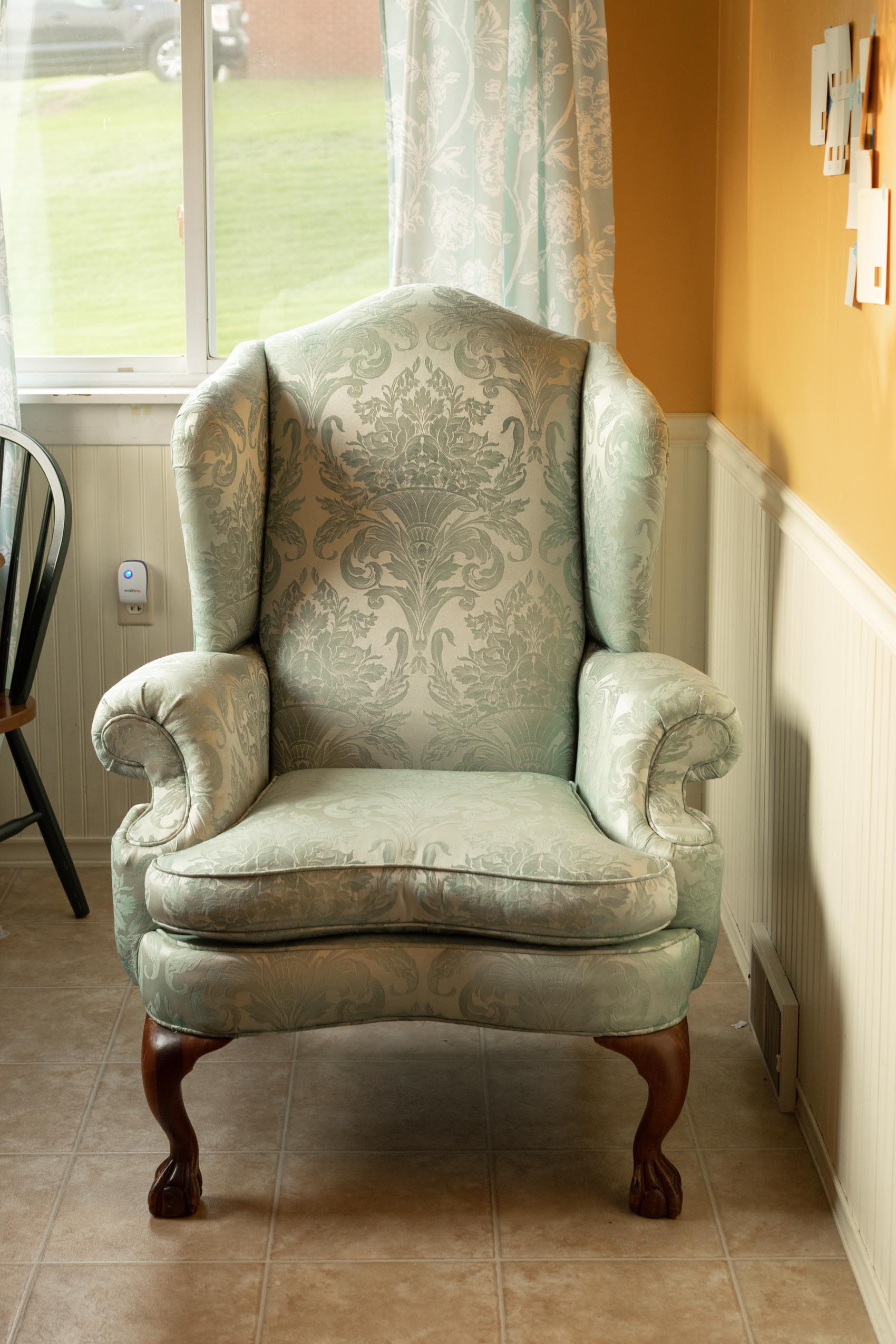 Progress photo of a wing back chair being dyed with Rit Dye in Evening Blue and Pearl Grey
