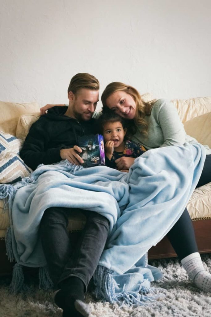 Snuggle on the couch with our niece watching Sing and eating popcorn.